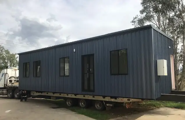 A modern black granny flat with dark cladding